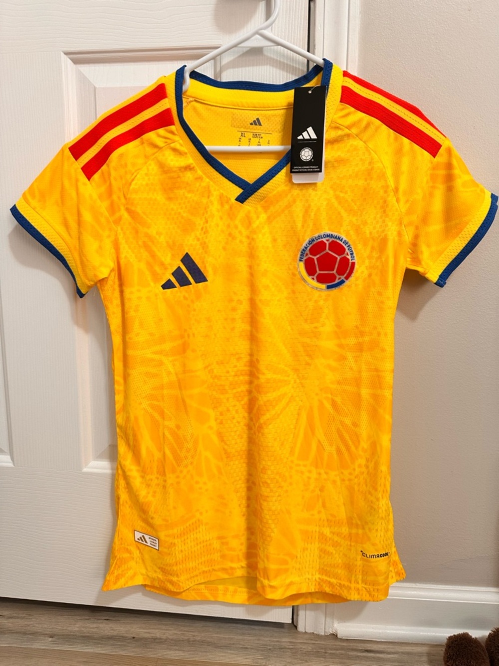 Women adidas Kids Yellow Soccer Jersey with Red Stripes and Blue Trim